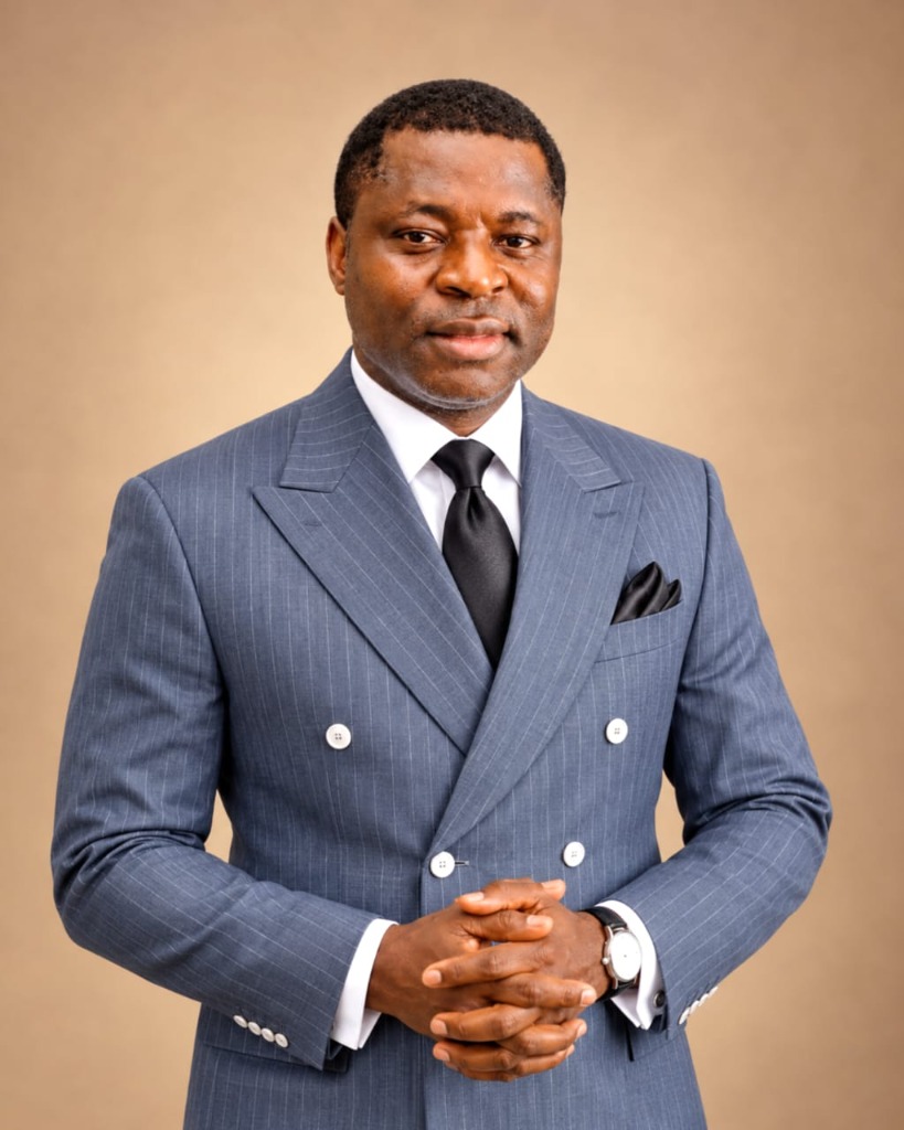 Prophet Samuel Adebayo Ojo in tailored studio pinstripe suit